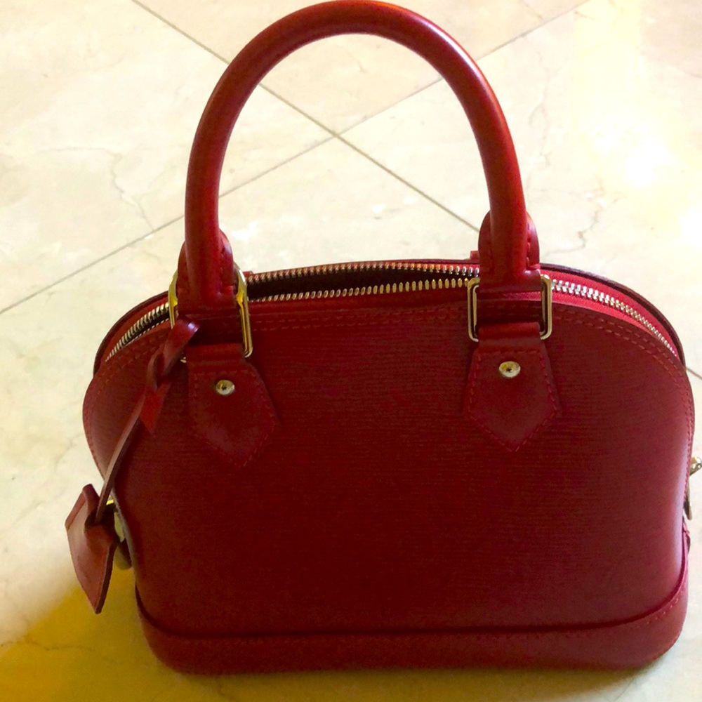 Alma BB Epi leather Carmin color with silver hardware